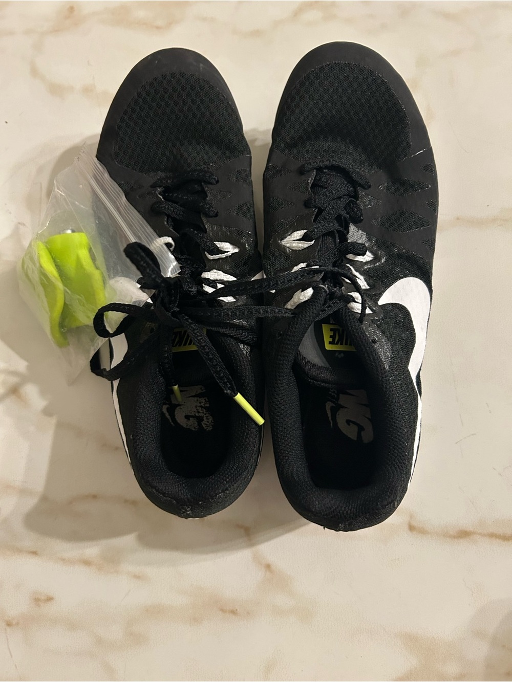 Nike Black Athletic Shoes with White Swoosh and Neon Yellow Accents
